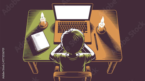 A person sits at a desk with a laptop candles and a book in a dimly lit room from a top view
