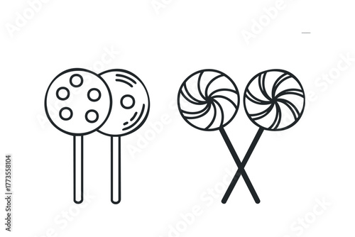 Two lollipop icons with different swirl designs and polka dots