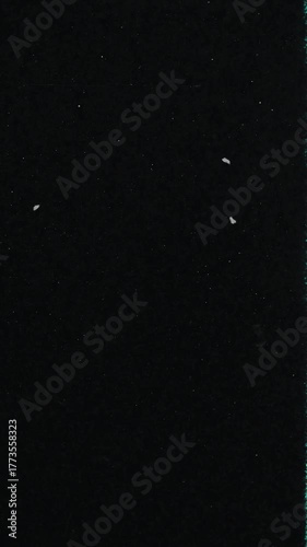 Scratch Effect with Glare on a Black Background