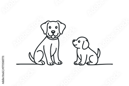 Two dogs sitting side by side looking at each other