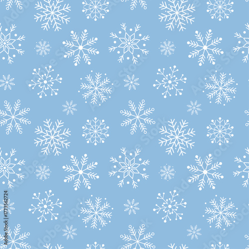 Seamless pattern with white snowflakes on blue background. Elegant winter background for Christmas and New Year wrapping paper, greeting cards, textile, and festive decoration. Vector design.