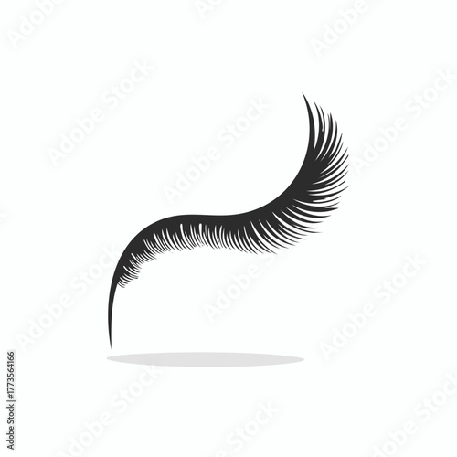 Elegance and allure: single black eyelash extension isolated on a pristine background