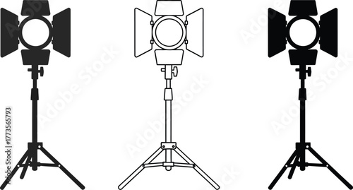 Three studio lights with stands in black and white vector illustration