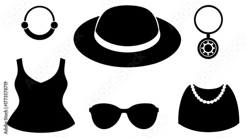 Summer vacation essentials arranged in a simple black and white fashion layout