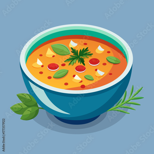 Tomato and vegetable soups in a bowl with fresh basil and parsley