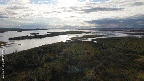 Wallpaper Mural Aerial view of Reflections lake, a beautiful landscape with the sun's rays reflecting from the water, creating a stunning view, Palmer, Alaska, United States. Torontodigital.ca