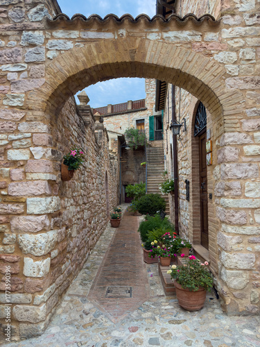 beautiful view of an alley in Spello, a famous medieval village in Umbria renowned for its flower-lined streets