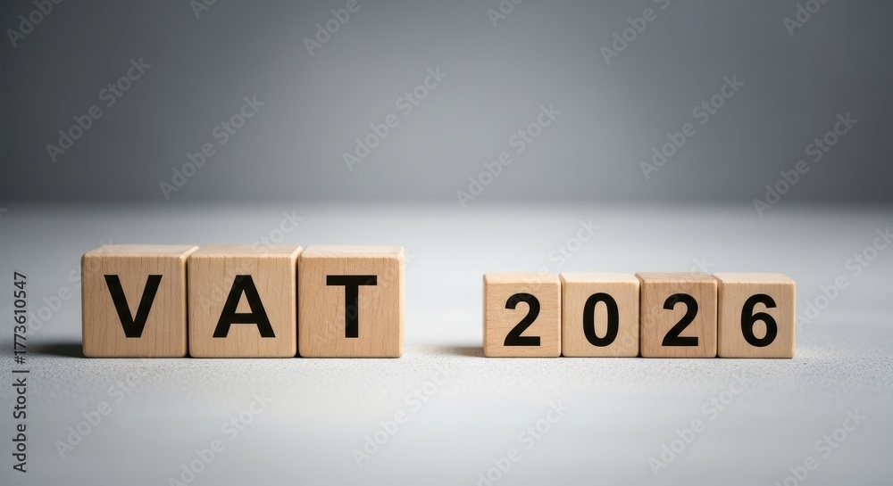 Obraz premium Grey Wooden Cube with Tax & VAT Symbol Conceptual Business Imagery, Perfect for Corporate Websites and Presentations.