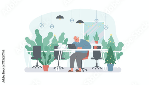 Senior businessman working late on a laptop in a Christmas decorated office stressing about deadlines