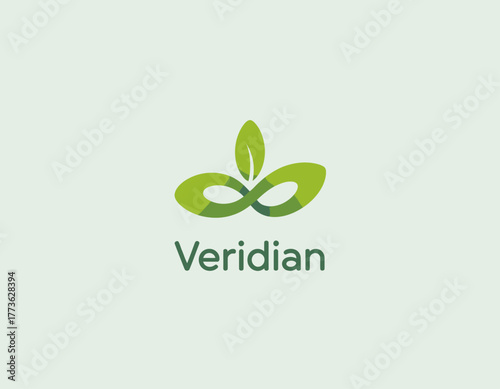 This image showcases a modern logo design featuring stylized green leaves and an infinity symbol, representing sustainability and harmony with nature in branding.