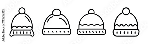 Set of four cozy knitted beanies with pom poms for winter warmth