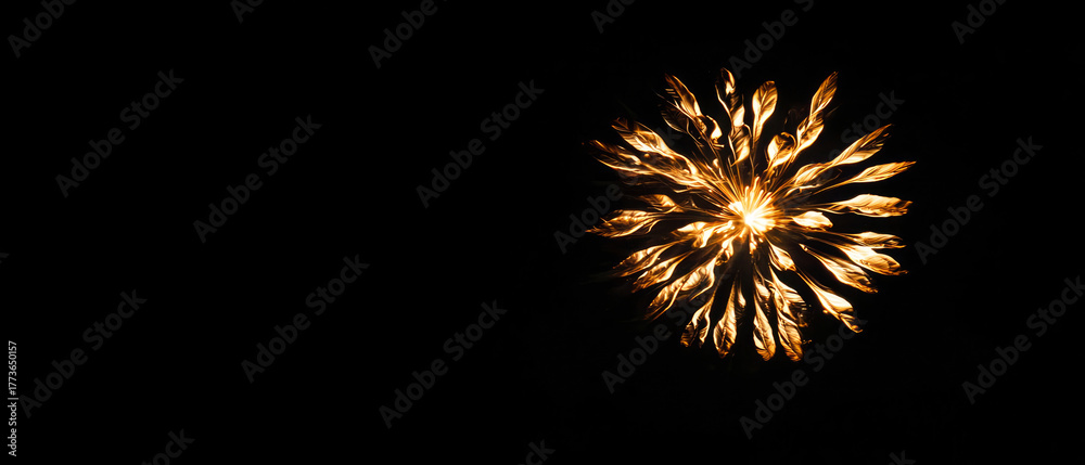 Obraz premium Minimalist background with golden sparklers on black. Elegant festive composition suitable for holiday greetings, banners, luxury invitations, and seasonal promotions.
