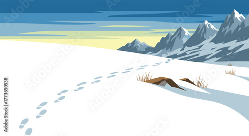 Winter landscape with snowy mountains and footprints under a blue sky