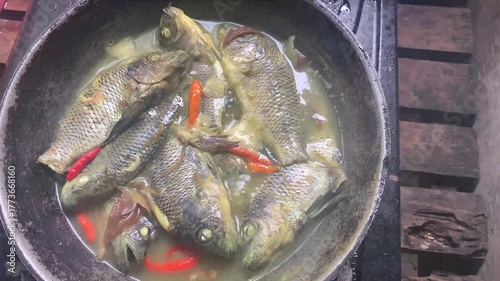 Boiling tilapia into tasty meal