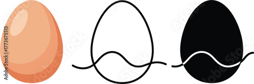 Three eggs with varying styles on a white background flatlay