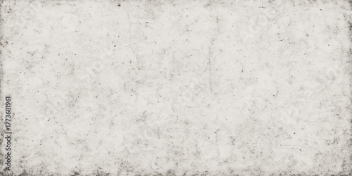 An old textured wall background features a blank grey concrete surface with a marble and white paper pattern