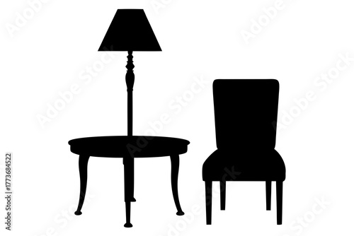 A classic floor lamp stands beside a decorative side table and a tall upholstered chair in a stark black silhouette against a white background
