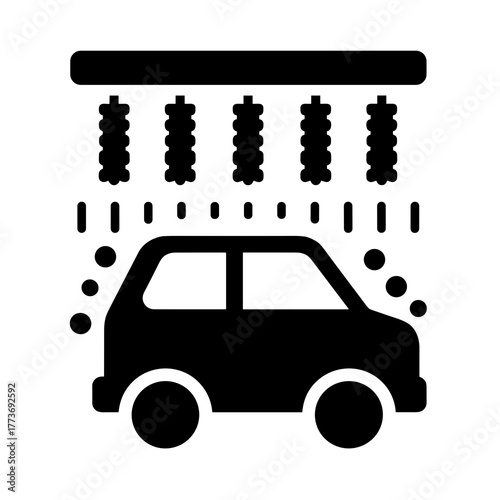 An automated carwash system cleans vehicles with brushes and water, providing a quick and efficient service.