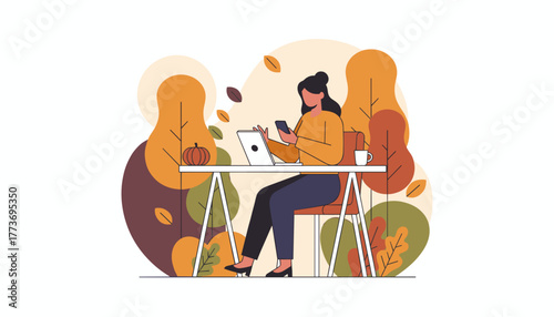 Woman working remotely with laptop and phone embracing the cozy autumn work season