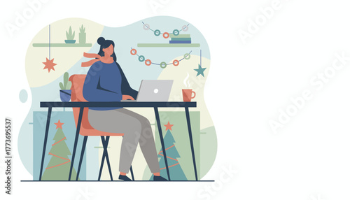 Woman working remotely on a laptop in a cozy festive winter home office setting
