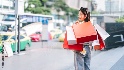 Walking asian woman travel and shopping in city lifestyles at outdoors on day
