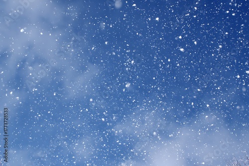 Heavy winter blizzard beginning as snow falls from the sky