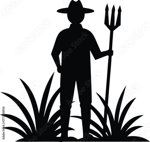 Silhouette of a farmer holding a pitchfork and a tool in hand, standing on grassy ground with plants around