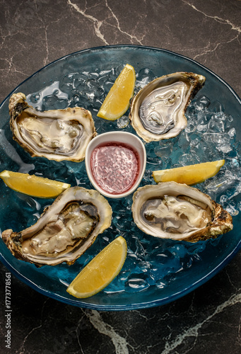 Wallpaper Mural fresh galician raw oysters on ice in gourmet vigo restaurant table in spain Torontodigital.ca