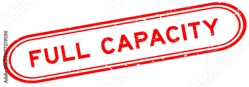 Grunge red full capacity word rubber seal stamp on white background