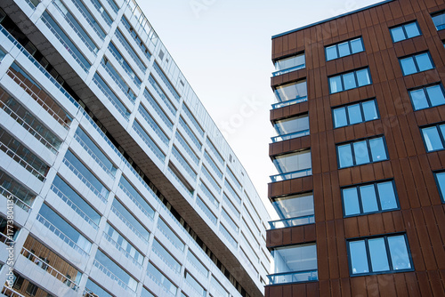 Stockholm modern apartment complex showcasing contemporary residential architecture and clean facade design captured in daylight with geometric symmetry and minimalist Scandinavian aesthetic