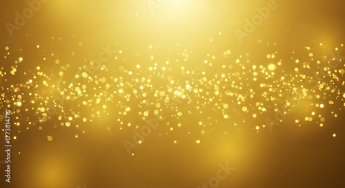 Abstract shimmering golden bokeh lights and sparkles festive celebration background
