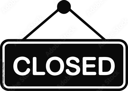 Black and white closed sign hanging on white background