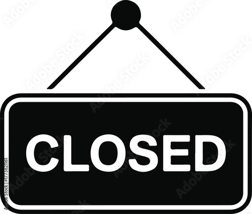 Black and white closed sign hanging on white background