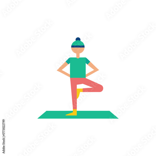 Person in tree pose on yoga mat