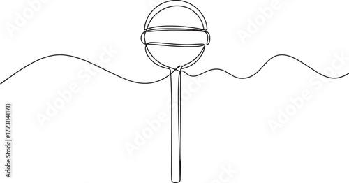 Minimalist continuous line art of a lollipop on a stick against