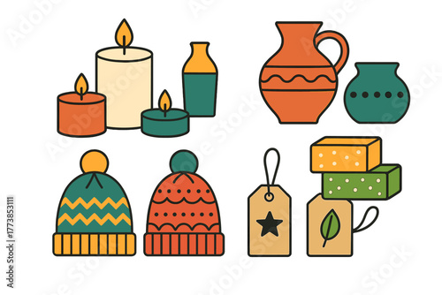Collection of cozy seasonal objects including burning candles, clay pottery, knitted caps, and decorative gift tags