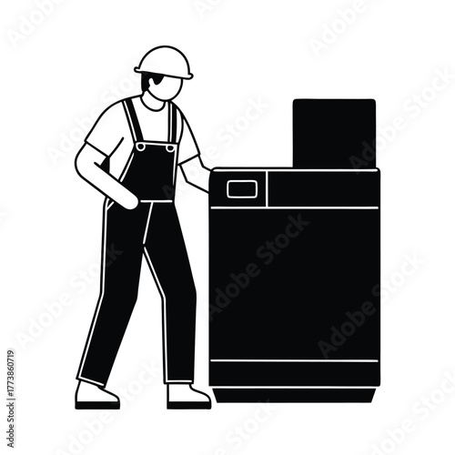 Man in overalls and hard hat standing next to a large black machine worker repair