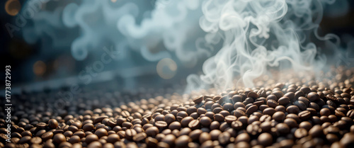 Steaming freshly roasted robusta or arabica coffee beans closeup creating rich aroma and warm steam vapor rising texture background.