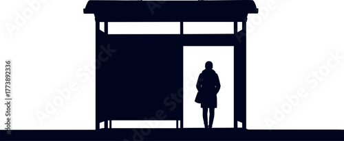Silhouette of a person waiting at a bus stop shelter, contemplating travel or a journey
