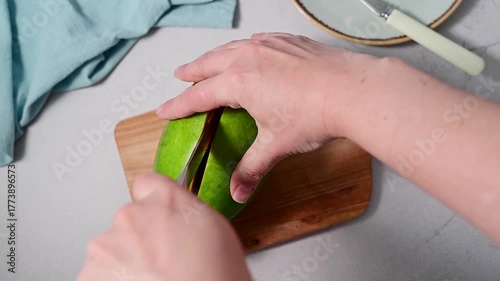 Papaya orange fruit cutted in halves, bright food photo