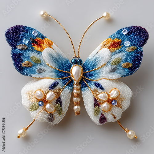 blue and silver butterfly decorative pin with pearls 