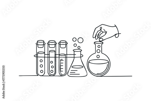 Laboratory glassware with hand adding liquid