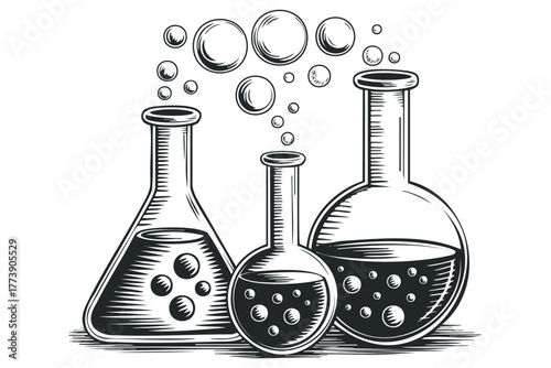 Three laboratory flasks with bubbling liquid