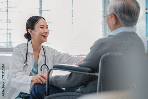 compassionate female doctor gently holds her elderly male patient’s hand, offering comfort and reassurance during a medical examination. With empathy and care, she listens attentively, supporting 