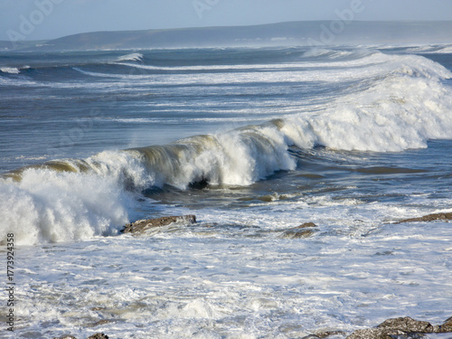 waves breaking on the rocks