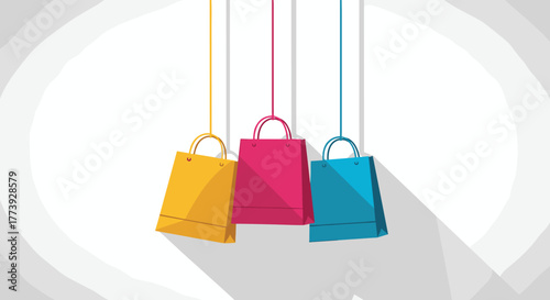 Colorful shopping bags hanging from above shadows below.