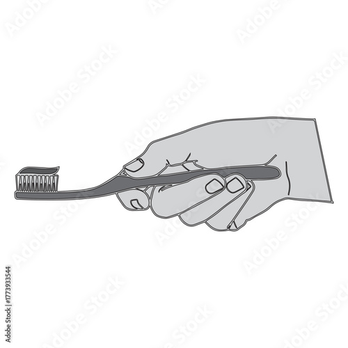 Hand holding a brush