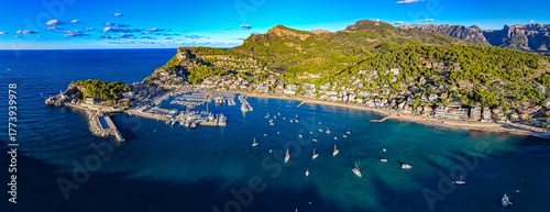 Golden Hour Aerial Panorama of Port Soller Harbor and Tramuntana Mountains in Mallorca, Spain