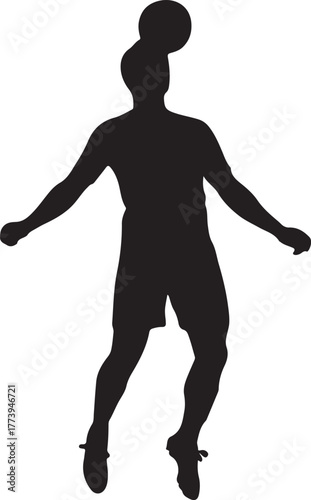 Silhouette of soccer player heading the ball during match play
