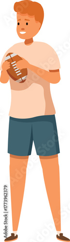 Redhead young man holding a rugby ball, ready for the game, promoting sport activity and healthy lifestyle